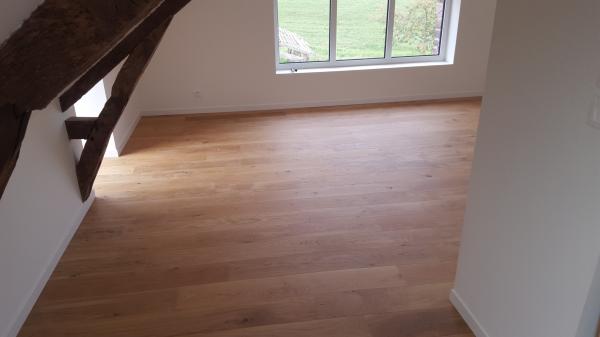 Pose de sols à Breteil